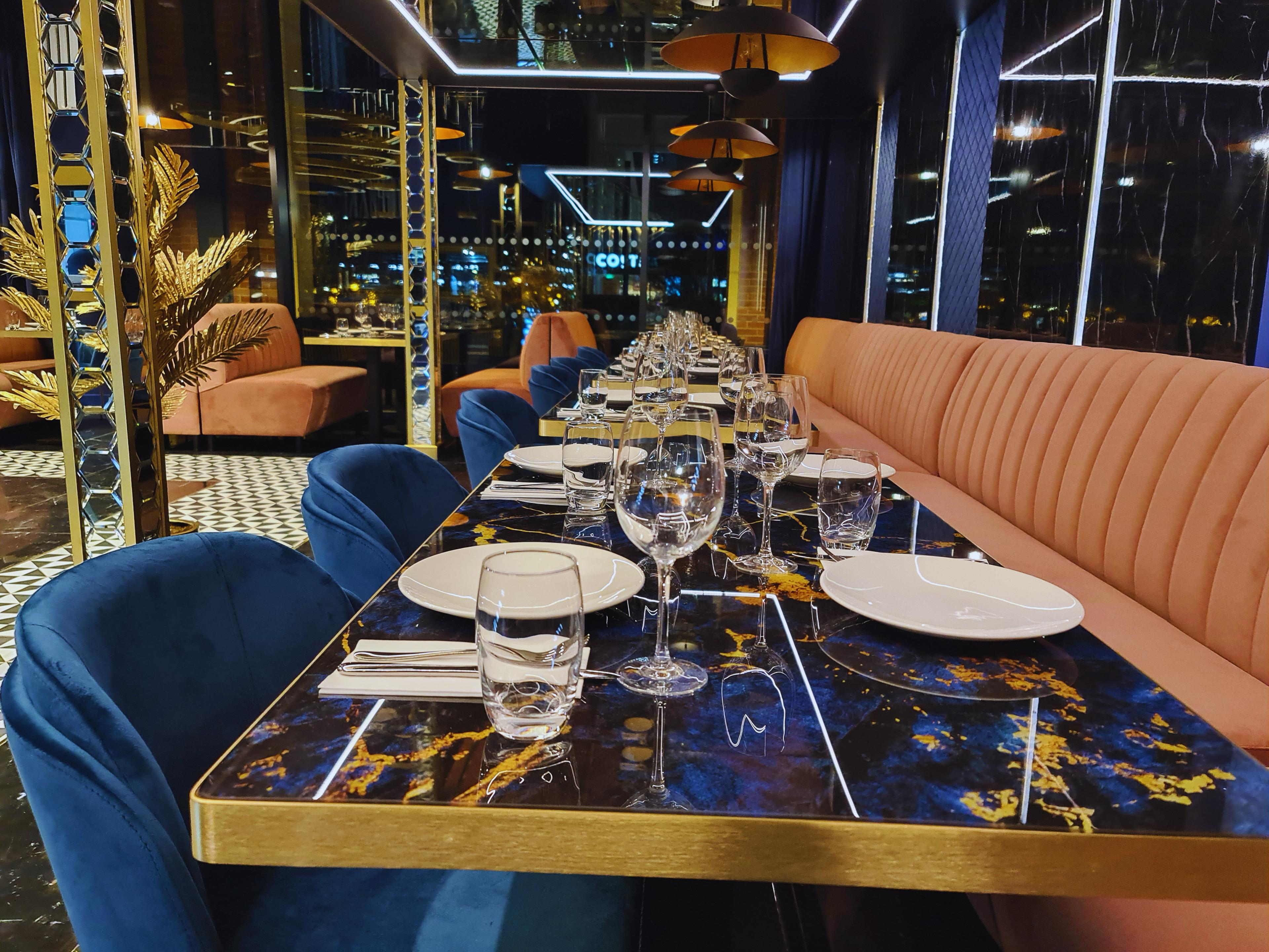 The candlelit dining room at Opuz Aylesbury